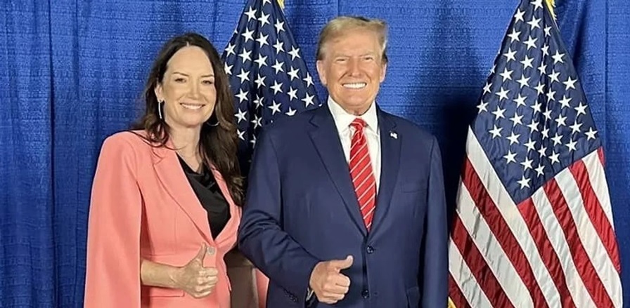 Rollins, en la imagen junto a Trump